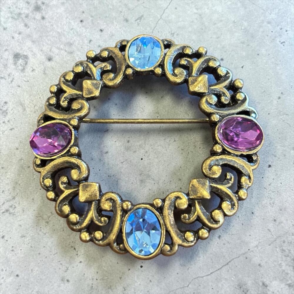 1928 Jewelry Co Blue Purple Rhinestone Circle Brooch Victorian Revival Pin
